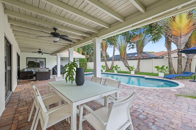 view of patio with ceiling fan, a fenced backyard, grilling area, outdoor dining area, and outdoor lounge area