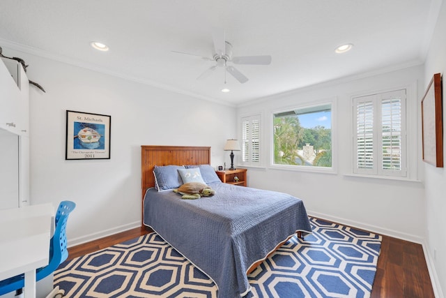 bedroom with baseboards, ceiling fan, wood finished floors, crown molding, and recessed lighting