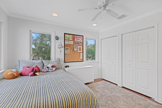 bedroom featuring crown molding, recessed lighting, radiator, visible vents, and wood finished floors