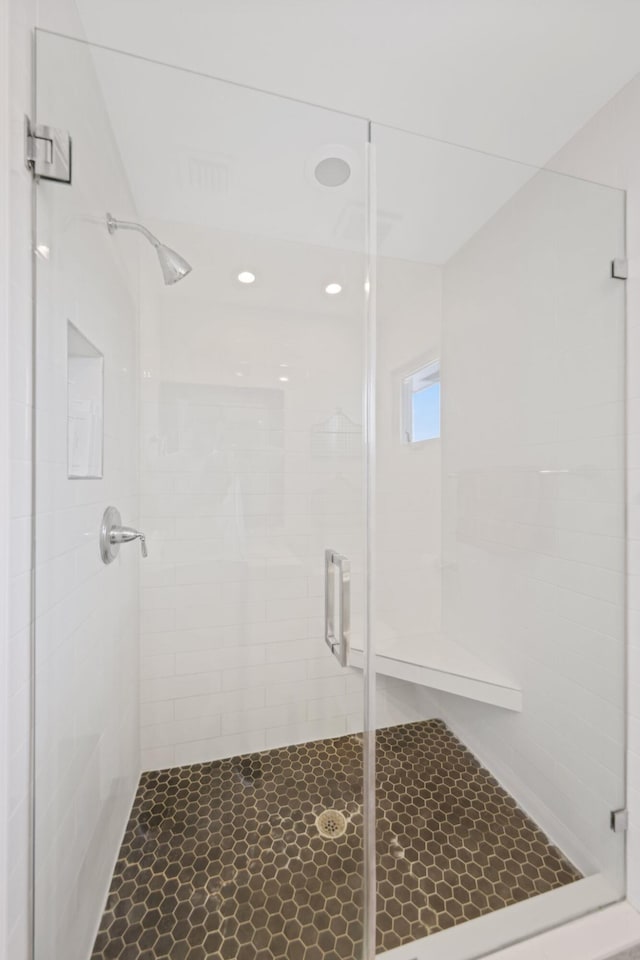 bathroom with a stall shower