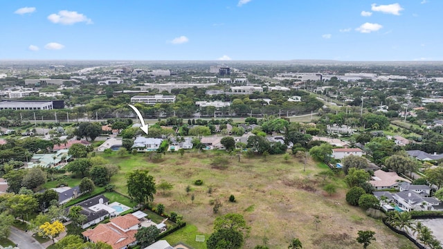 birds eye view of property with a residential view