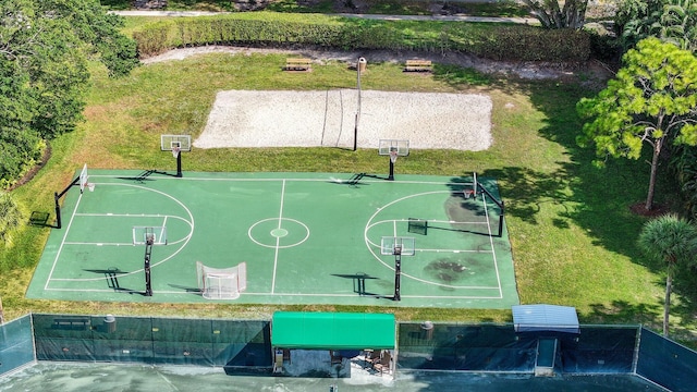 view of basketball court featuring community basketball court and a lawn