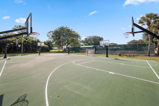 view of sport court featuring community basketball court and fence