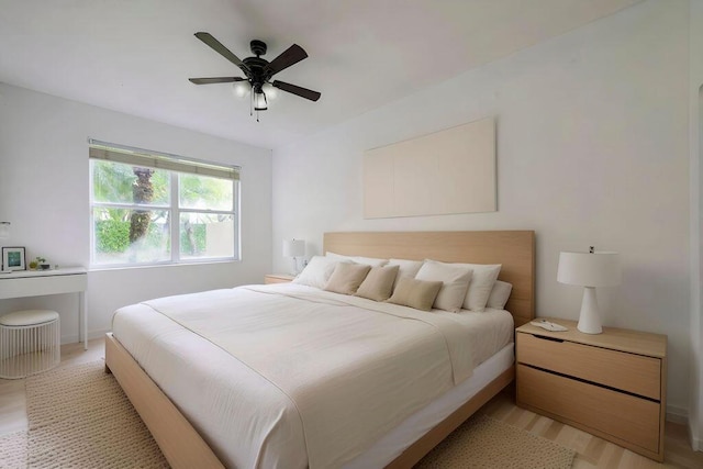 bedroom featuring a ceiling fan and light wood-style floors