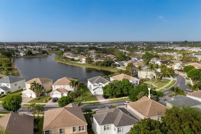 aerial view with a water view and a residential view