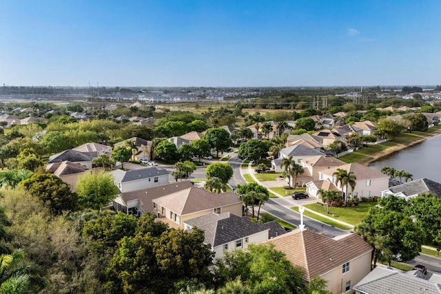 aerial view featuring a residential view and a water view