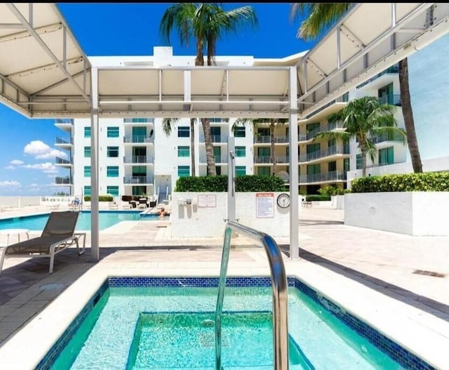 pool with a patio