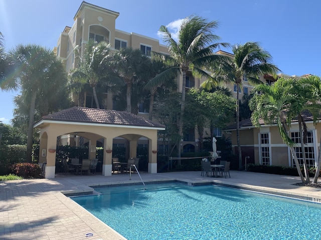 700 Scotia Dr Unit 103, Hypoluxo, FL 33462 - pool with a patio area and a gazebo