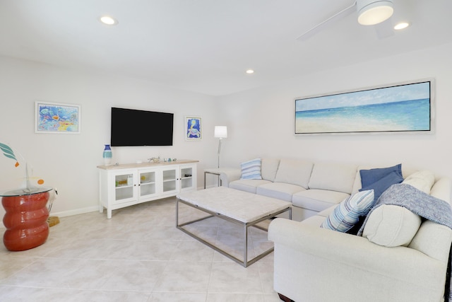 living area featuring light tile patterned flooring, recessed lighting, baseboards, and ceiling fan