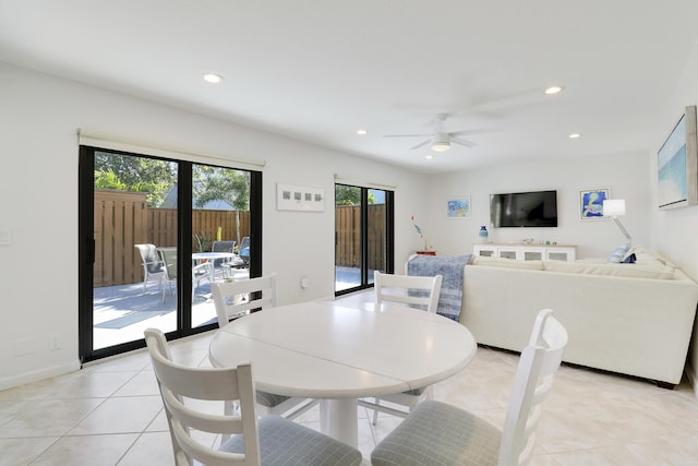 dining room featuring light tile patterned floors, recessed lighting, baseboards, and a ceiling fan