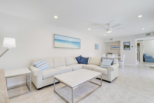 living room with a ceiling fan, recessed lighting, visible vents, and baseboards