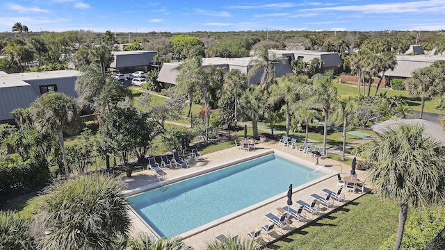 community pool with a patio area