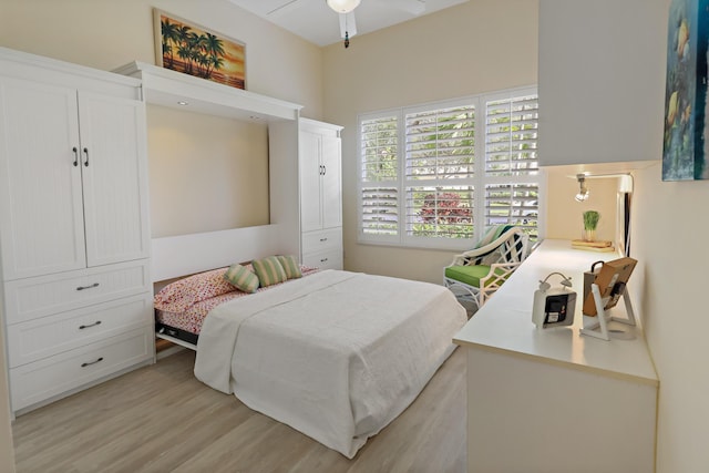 bedroom with light wood finished floors