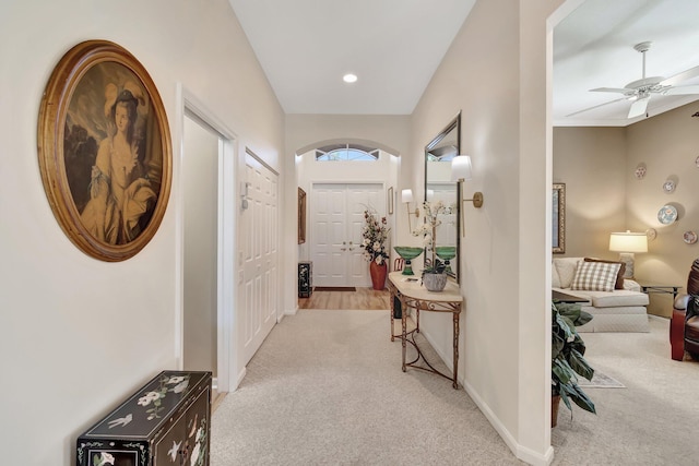 hallway with carpet, baseboards, and recessed lighting