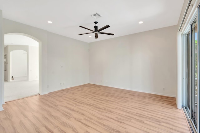 7314 Toscane Ct, Boynton Beach, FL 33437 - unfurnished room featuring light wood-type flooring, a ceiling fan, arched walkways, recessed lighting, and baseboards