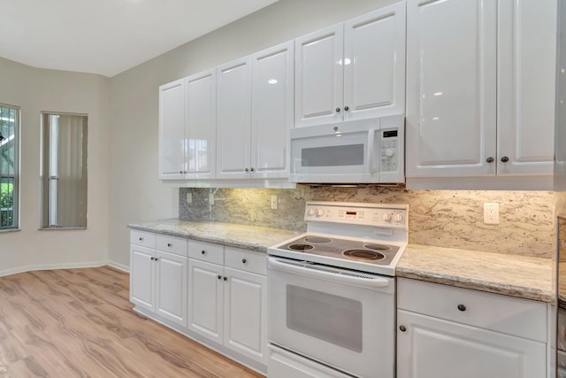 7314 Toscane Ct, Boynton Beach, FL 33437 - kitchen with white appliances, decorative backsplash, light wood finished floors, and white cabinets