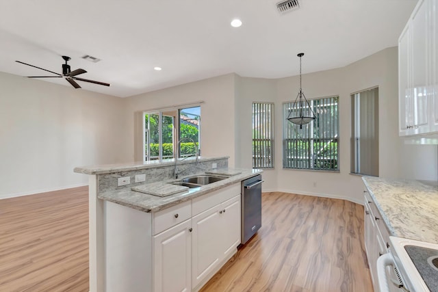 7314 Toscane Ct, Boynton Beach, FL 33437 - kitchen featuring a sink, stainless steel dishwasher, light wood-type flooring, white cabinets, and stove