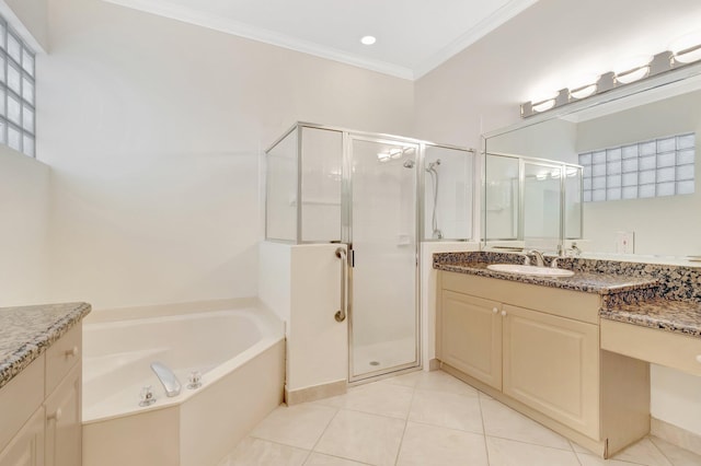 bathroom featuring a garden tub, a shower stall, ornamental molding, vanity, and tile patterned flooring