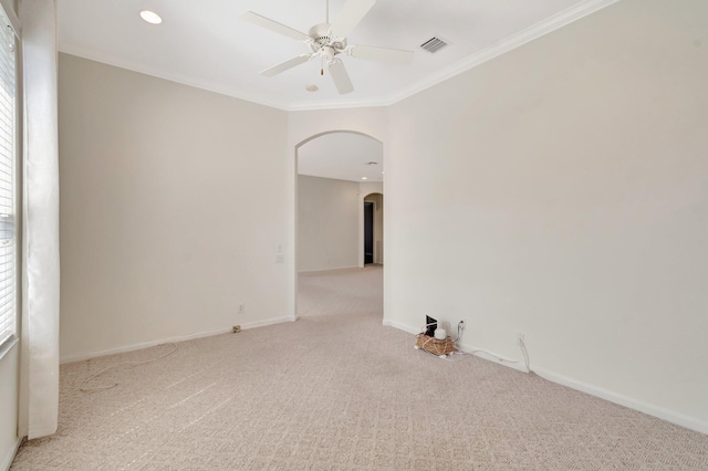 7314 Toscane Ct, Boynton Beach, FL 33437 - empty room with arched walkways, a ceiling fan, carpet flooring, baseboards, and crown molding