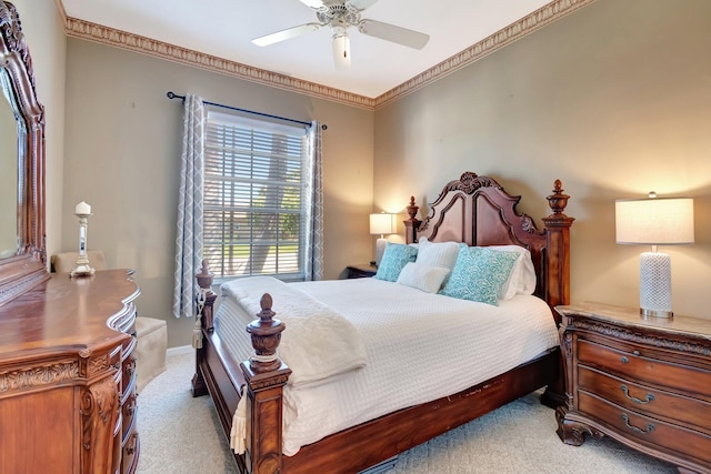 bedroom featuring baseboards, a ceiling fan, crown molding, and carpet flooring