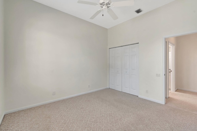 7314 Toscane Ct, Boynton Beach, FL 33437 - unfurnished bedroom featuring light carpet, baseboards, a closet, and a ceiling fan