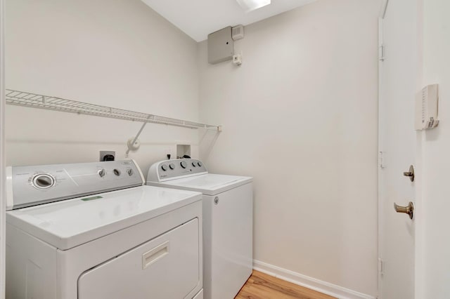 7314 Toscane Ct, Boynton Beach, FL 33437 - laundry area with washer and dryer, baseboards, and light wood-style floors