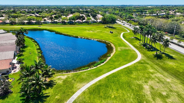 drone / aerial view featuring a water view and a residential view