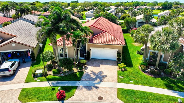 view of property's community with a yard