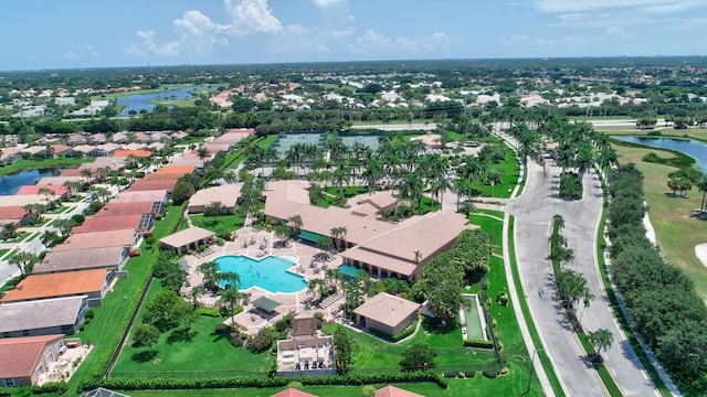 bird's eye view featuring a water view and a residential view