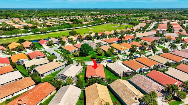 aerial perspective of suburban area featuring a golf club