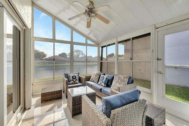 sunroom featuring a water view, wooden ceiling, ceiling fan, and vaulted ceiling