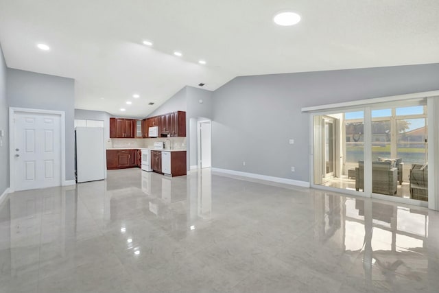 living area with recessed lighting, marble finish floor, vaulted ceiling, and baseboards