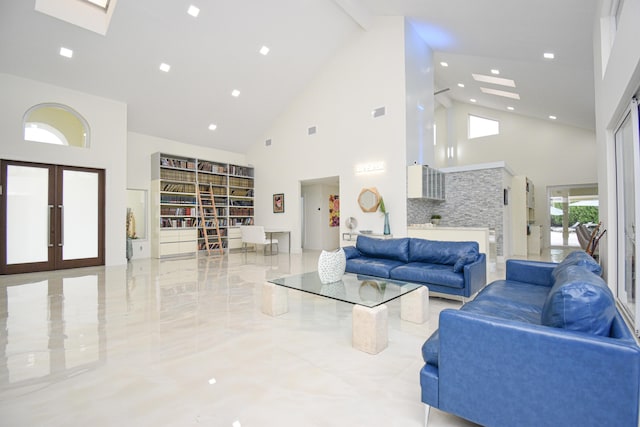 living area featuring visible vents, high vaulted ceiling, marble finish floor, french doors, and a skylight