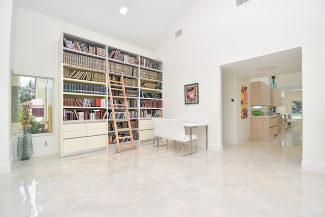 sitting room featuring visible vents, marble finish floor, high vaulted ceiling, and baseboards