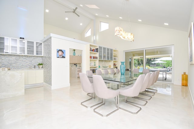 dining area with beamed ceiling, high vaulted ceiling, marble finish floor, recessed lighting, and an inviting chandelier