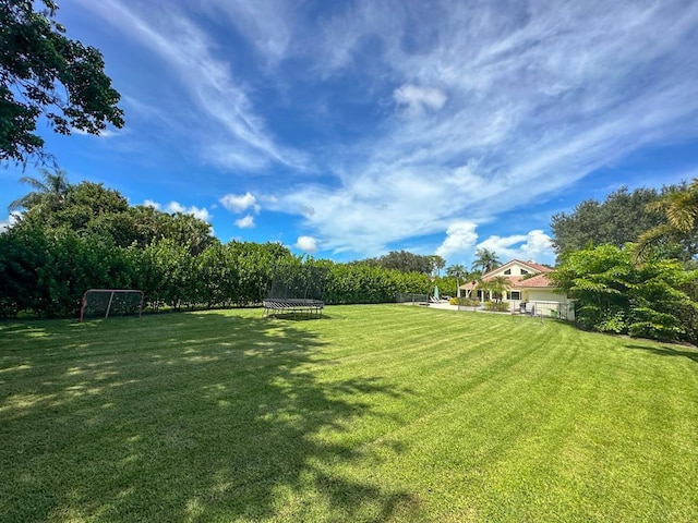 view of yard with fence