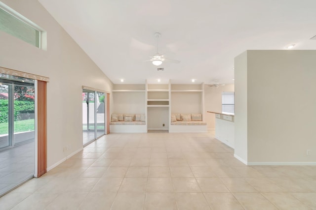 unfurnished living room featuring light tile patterned floors, built in features, visible vents, baseboards, and a ceiling fan