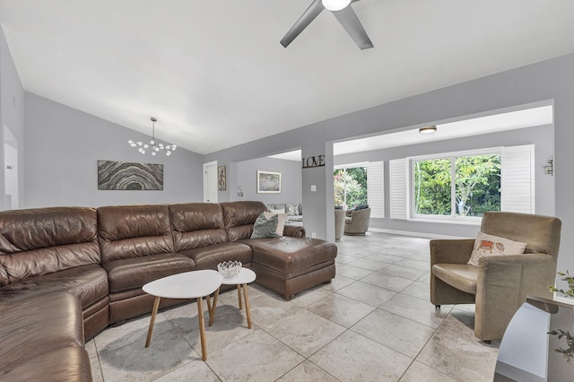 living area featuring light tile patterned floors, ceiling fan, and vaulted ceiling