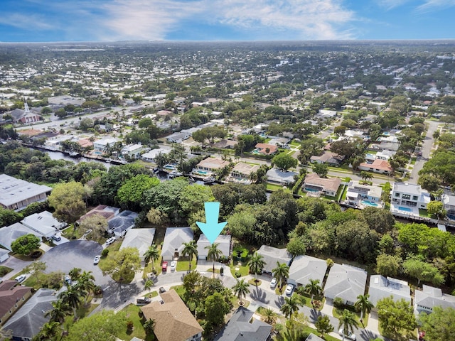 birds eye view of property with a residential view