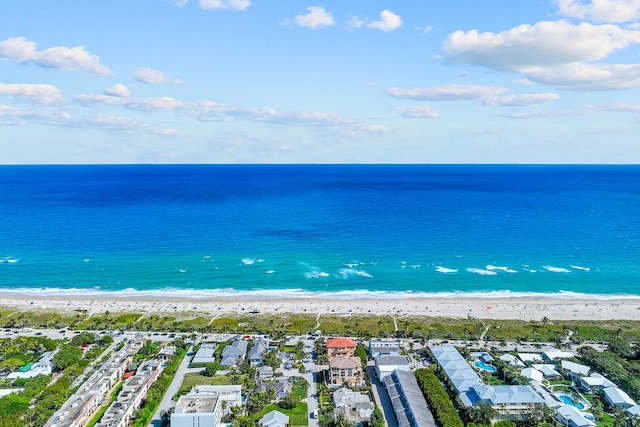 birds eye view of property with a residential view, a view of the beach, and a water view