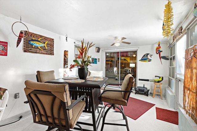 dining room with ceiling fan