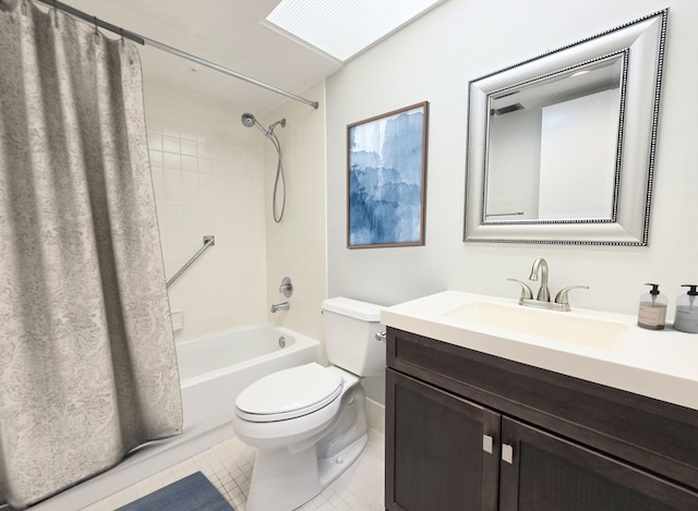 bathroom with vanity, shower / bath combo with shower curtain, tile patterned flooring, and toilet