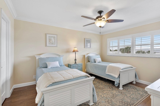 bedroom with ceiling fan, baseboards, wood finished floors, and ornamental molding