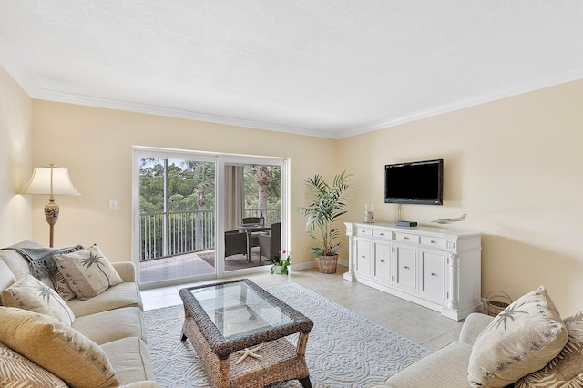 living room featuring baseboards, light tile patterned flooring, and crown molding