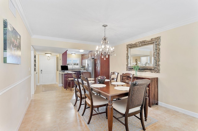 dining space featuring baseboards, an inviting chandelier, light tile patterned flooring, and crown molding