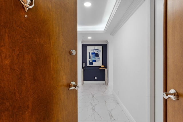 hallway featuring marble finish floor, ornamental molding, recessed lighting, and baseboards