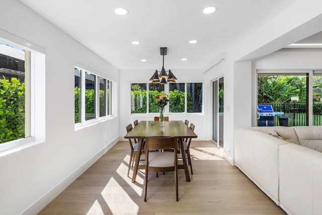 dining area featuring plenty of natural light, recessed lighting, and light wood-type flooring