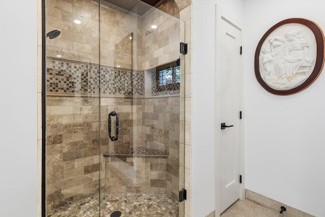 full bath featuring a stall shower