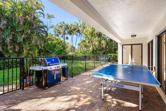 view of patio / terrace with outdoor dining space and fence