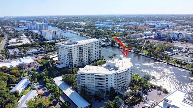 drone / aerial view with a water view and a city view